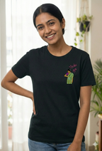 Woman wearing a black t-shirt with a Thaki Gai graphic design on left chest