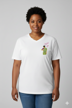 Woman wearing a white t-shirt with a Thaki Gai graphic design on left chest