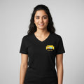 Woman wearing a black t-shirt with a  Kaam Chor graphic design on left chest