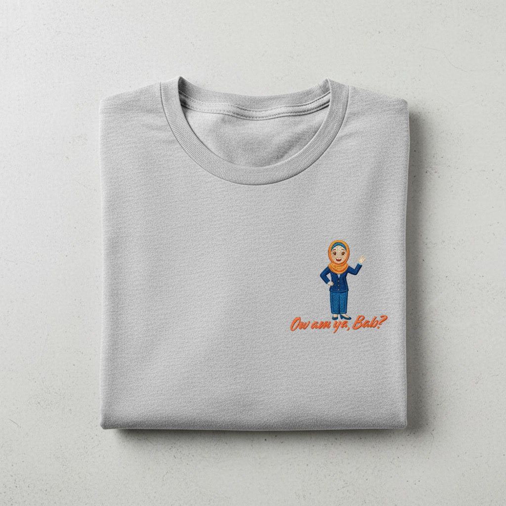 Grey t-shirt with a  'Ow am ya bab' hijab graphic design on left chest