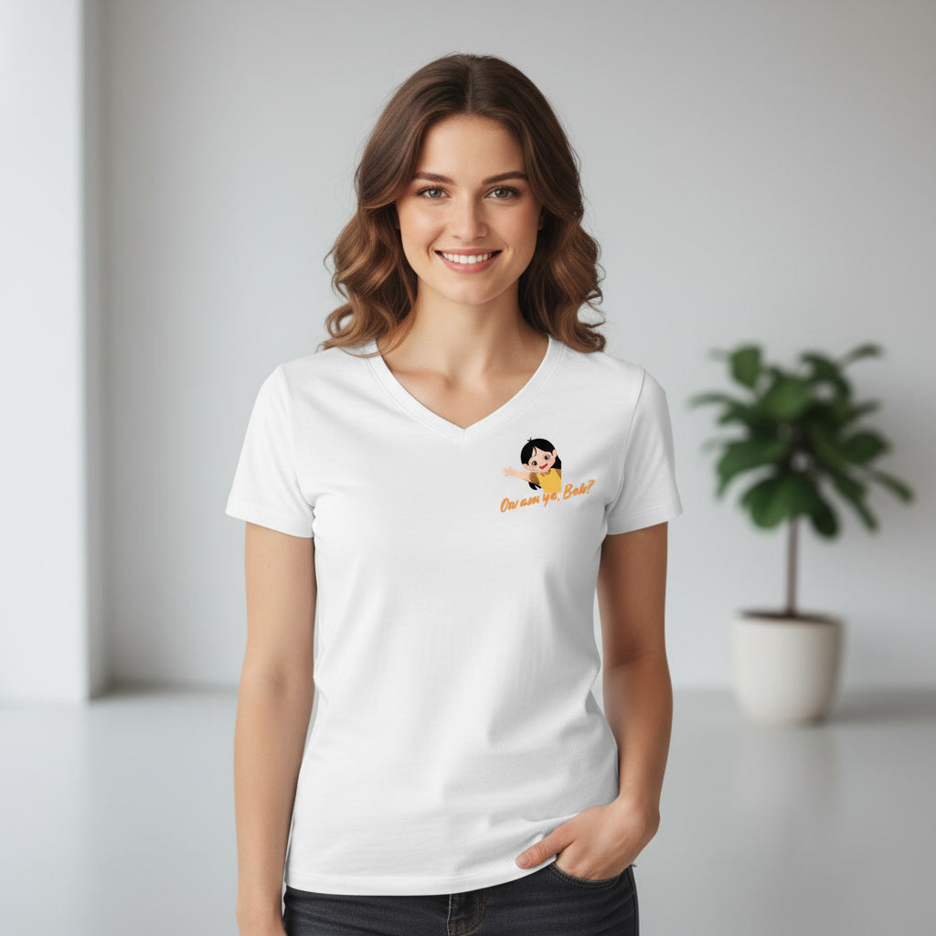 Woman wearing a white t-shirt with a  'Ow am ya bab' graphic design on left chest