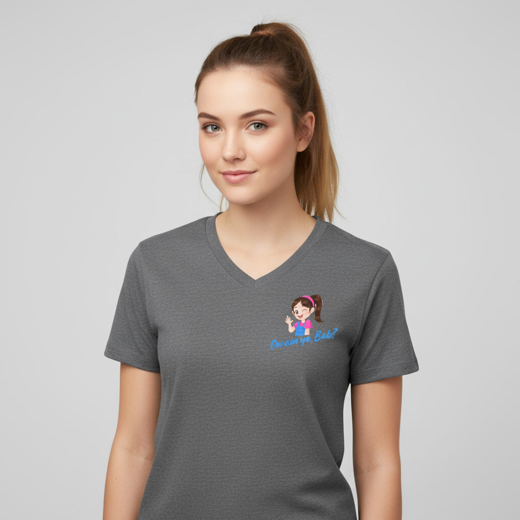 Woman wearing a grey t-shirt with a  'Ow am ya bab' graphic design on left chest
