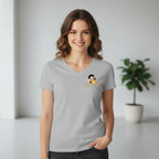 Woman wearing a grey t-shirt with a  'Ow am ya bab' graphic design on left chest